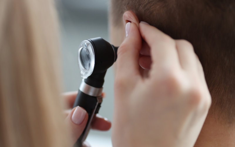 otoscope looking in an ear